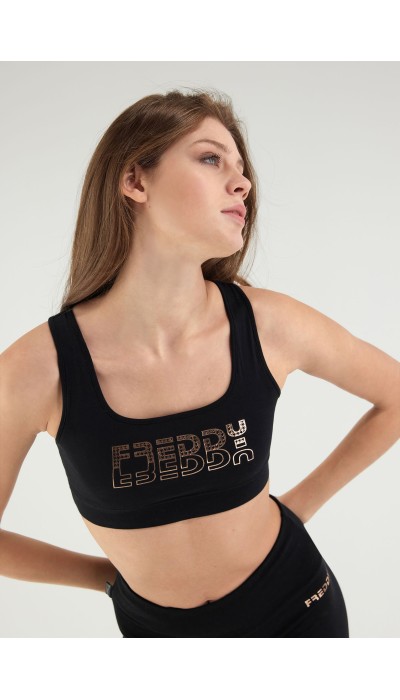 Freddy Medium support sports bra with a copper-hued Freddy print F2WBCB2