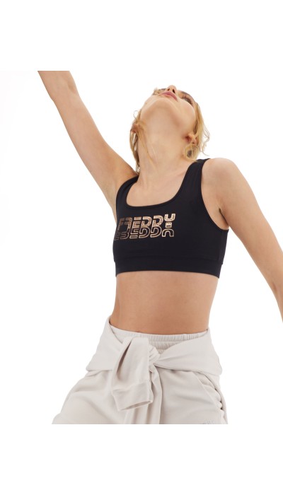 Freddy Medium support sports bra with a copper-hued Freddy print F2WBCB2