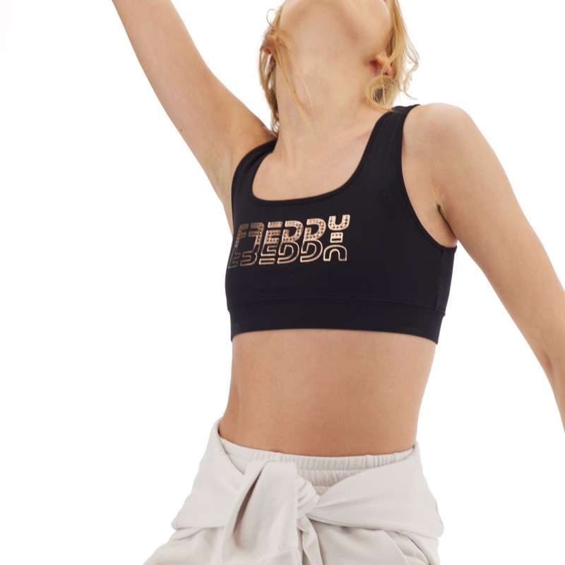 Freddy Medium support sports bra with a copper-hued Freddy print F2WBCB2